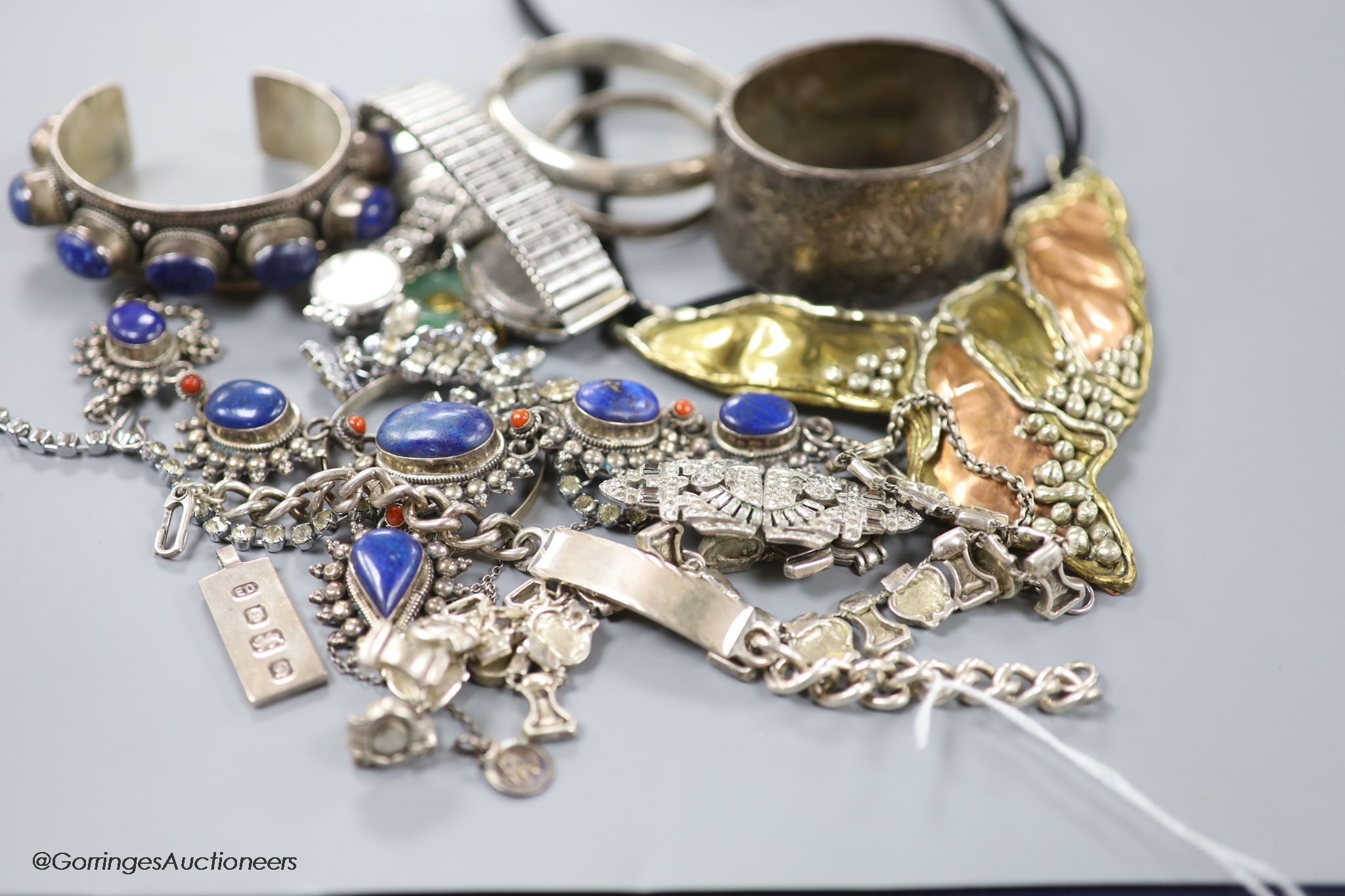 A collection of mixed silver and other costume jewellery.